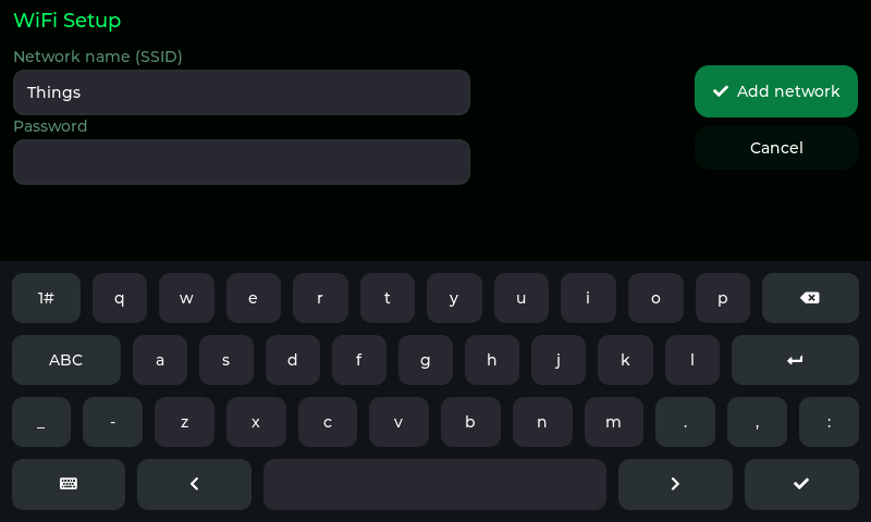 The WiFi Setup panel with the network name filled in and the keyboard open